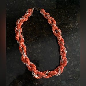 Statement necklace, orange with gold detail. 22in long with 6 extender.